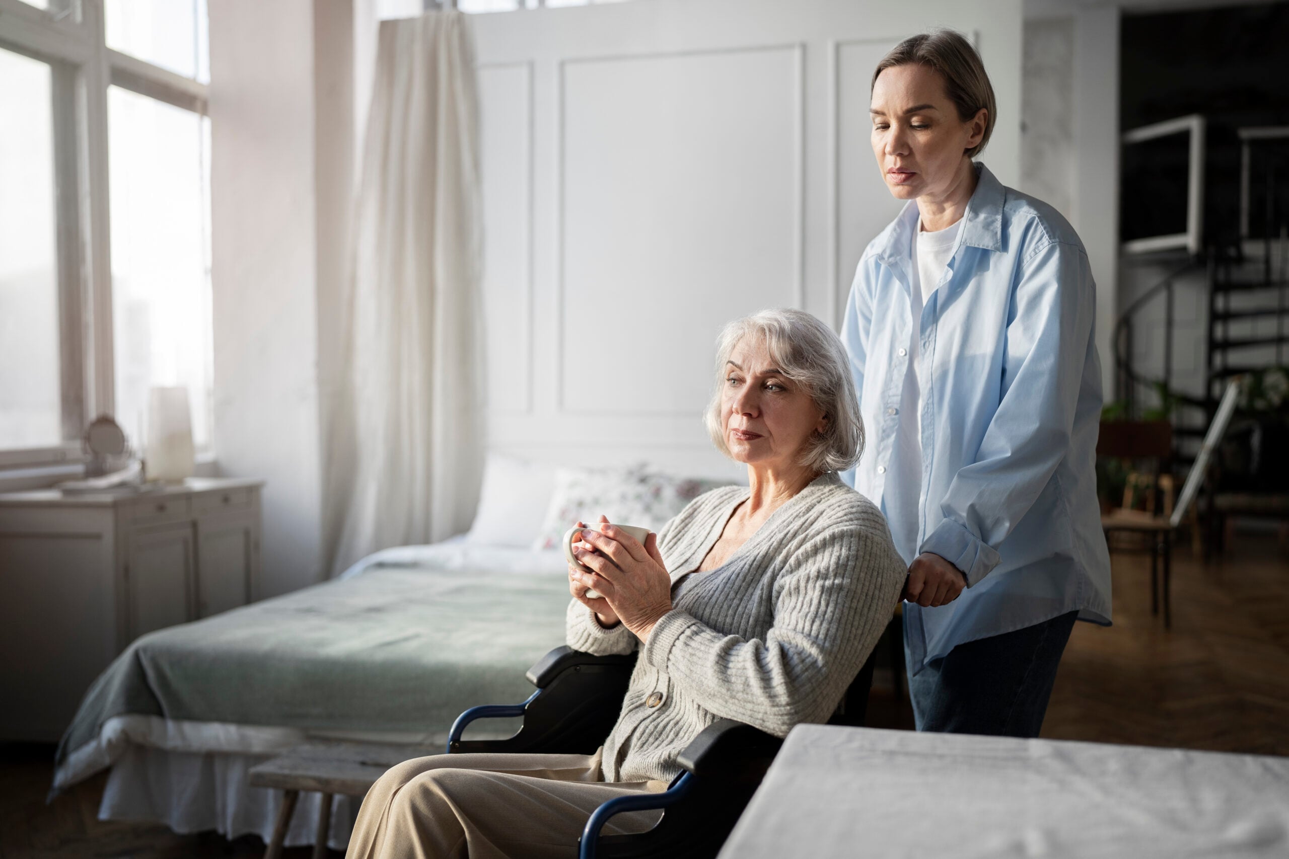 Doctor providing care and support to a patient in a wheelchair